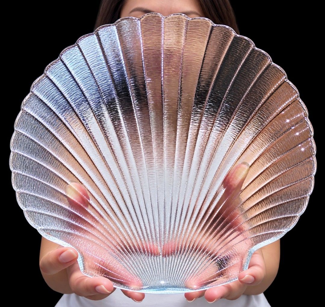 Vintage Glass Shell Platter (Category: Other Kitchenware & Tableware) located in Manila. Submitted by roibarbz (Listing ID 1459957975, Image 2). Description: The item appears to be a vintage Arcoroc France Coquillage clear glass scallop shell serving platter or plate, known for its textured fan shape and coastal design. Design: Scalloped sea shell or clam shell shape with ribbed fan details. Material: Pressed clear glass. Use: Serving platter or 