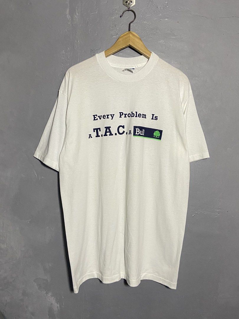 Vintage graphic Tee “Every Problem Is A T.A.C.A. Bull” (Category: Tshirts & Polo Shirts ) located in Cabuyao City. Submitted by chukz_x (Listing ID 1459951591, Image 1). Description: Vintage graphic Tee “Every Problem Is A T.A.C.A. Bull” Size : XL Dimes : 22W 30L Condition : Excellent Issue : none Price : 650 📍READY TO WEAR 📍Cabuyao Laguna.