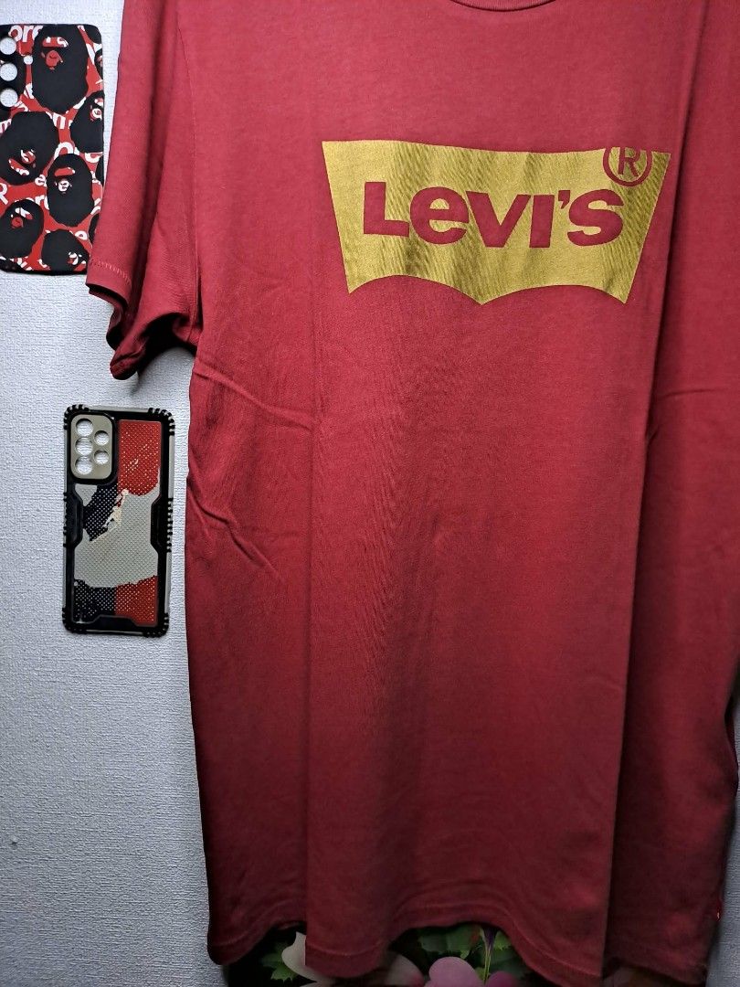 Vintage Levi's Script Maroon (Category: Tshirts & Polo Shirts ) located in Quezon City. Submitted by yaseen73 (Listing ID 1460012065, Image 3). Description: Levi's Maroon Metallic Golden Script 100% Cotton - Light Weight - Crew Neckline - Solid Print - Authentic - Medium on tag - Dimensions : Please Refer to the Photo - Color Rate 9.9/10 - PRE OWNED In Excellent Condition 650 or Best Offer Courier : J&T Lalamove MOP : gcash / Bank transfer Seller