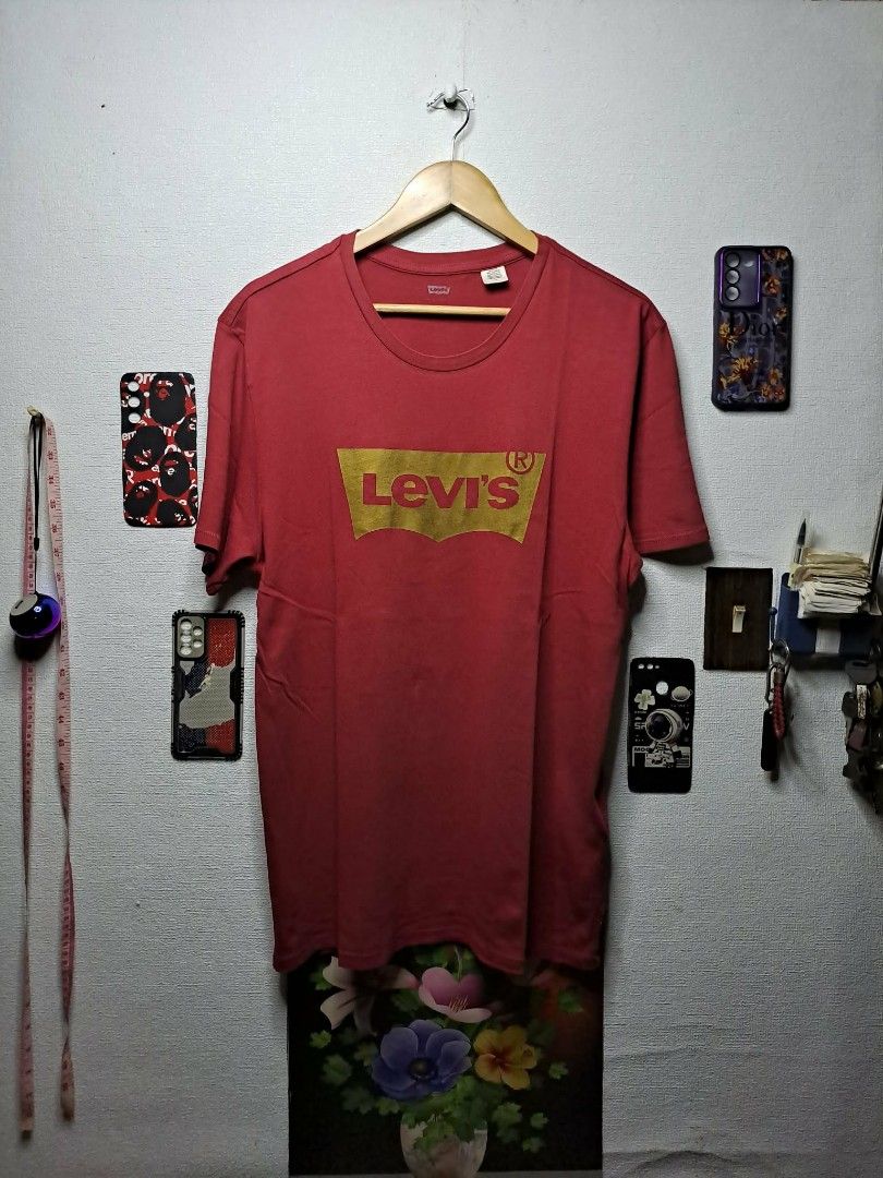 Vintage Levi's Script Maroon (Category: Tshirts & Polo Shirts ) located in Quezon City. Submitted by yaseen73 (Listing ID 1460012065, Image 1). Description: Levi's Maroon Metallic Golden Script 100% Cotton - Light Weight - Crew Neckline - Solid Print - Authentic - Medium on tag - Dimensions : Please Refer to the Photo - Color Rate 9.9/10 - PRE OWNED In Excellent Condition 650 or Best Offer Courier : J&T Lalamove MOP : gcash / Bank transfer Seller
