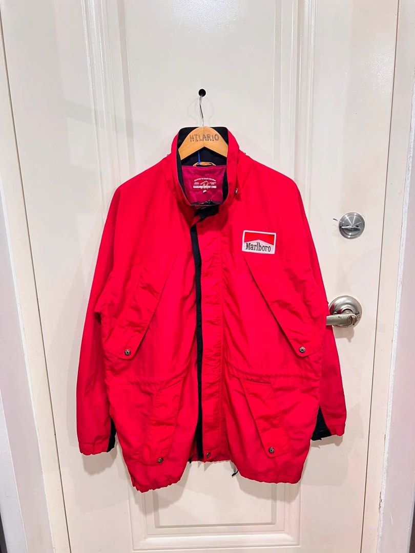 Vintage Marlboro Windbreaker (Category: Coats, Jackets and Outerwear) located in San Pedro. Submitted by _eyamarieii (Listing ID 1460098389, Image 1). Description: Vintage Marlboro Windbreaker Lightly Used Condition Color rate 9/10 Issue missing hood Size Medium ontag Width 25 Length 31 • 1,000+sf.