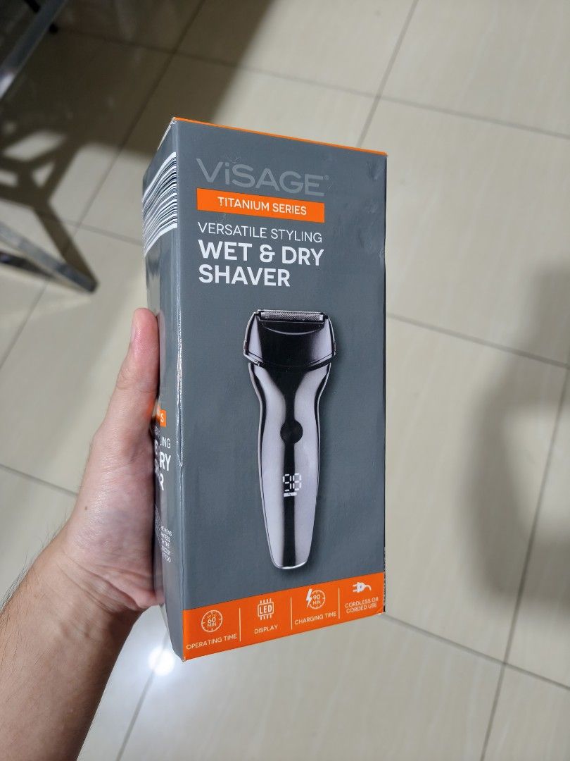 VISAGE Titanium Series Wet & Dry Shaver (Category: Men's Grooming) located in Manila. Submitted by paul.c29cruz (Listing ID 1460022076, Image 1). Description: - VISAGE Titanium Series Wet & Dry Shaver - Model: AP210262 - Versatile styling for all your grooming needs - Features a clear LED display - Quick 90-minute charging time - Can be used corded or cordless for convenience - IPX6 waterproof rating for safe use in the shower 100% ORIGINAL! BRAN