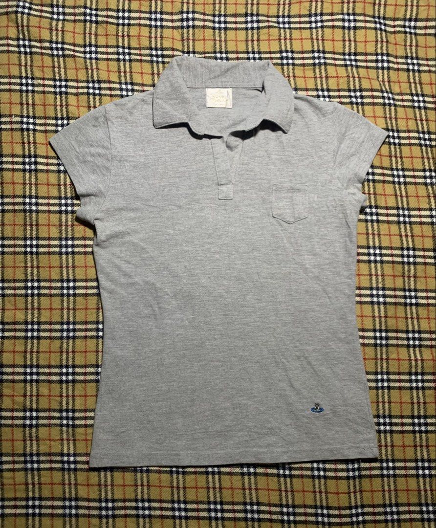 Vivienne Westwood Top (Category: Activewear) located in Claveria. Submitted by plasticcase__ (Listing ID 1459909555, Image 3). Description: - Brand: Vivienne Westwood - Color: Grey - Style: Polo Shirt - Condition: Good.