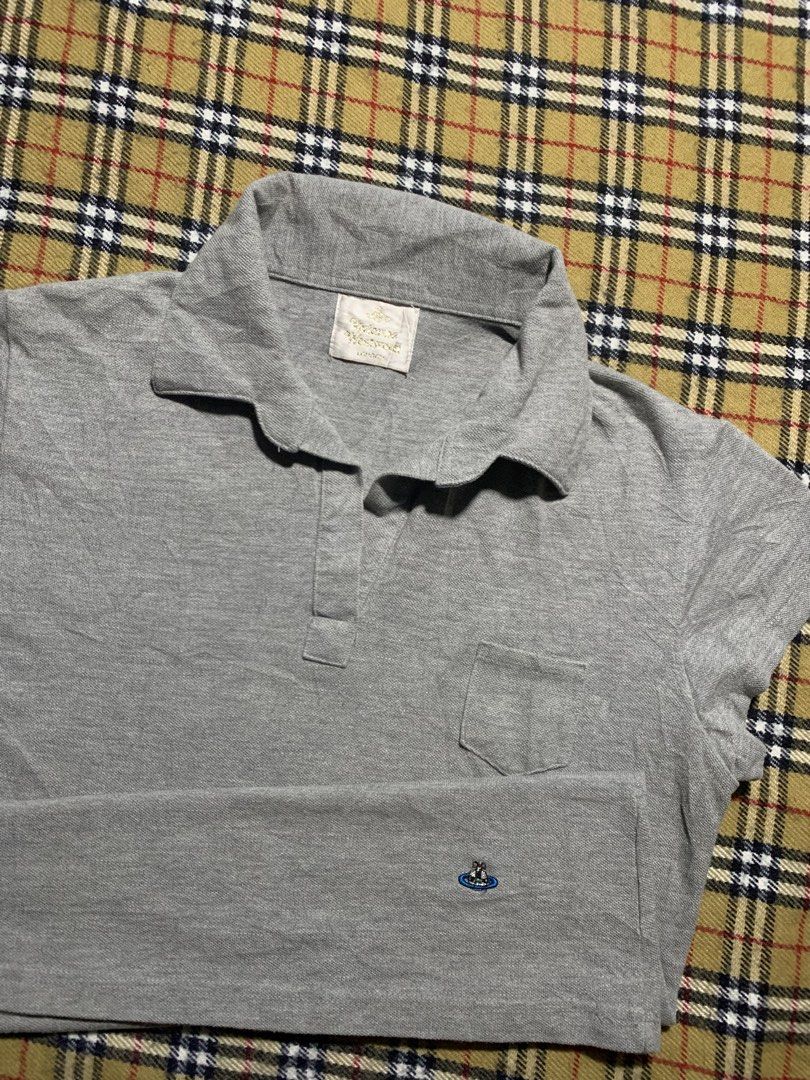 Vivienne Westwood Top (Category: Activewear) located in Claveria. Submitted by plasticcase__ (Listing ID 1459909555, Image 2). Description: - Brand: Vivienne Westwood - Color: Grey - Style: Polo Shirt - Condition: Good.