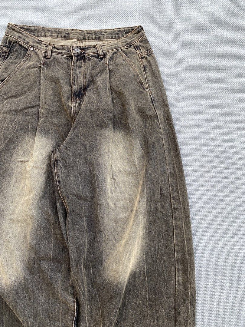 Washed Grey Baggy Jeans (Category: Jeans) located in Manila. Submitted by jairusdave65695 (Listing ID 1460059922, Image 3). Description: - Washed grey baggy fit jeans - Unique faded details throughout - Pleated front design - Relaxed streetwear style.