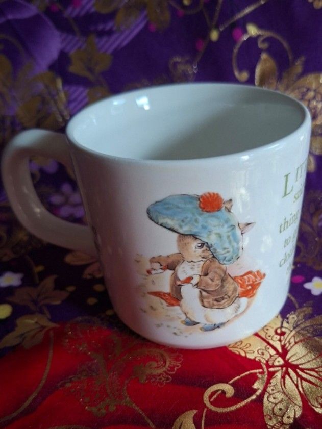 Wedgwood Peter Rabbit Mug (Category: Coffee & Tea Tableware) located in Consolacion. Submitted by luxekerei (Listing ID 1457200831, Image 3). Description: - vintage Wedgwood Beatrix Potter "Benjamin Bunny" children's mug featuring a classic illustration of Benjamin Bunny and Peter Rabbit on the front..