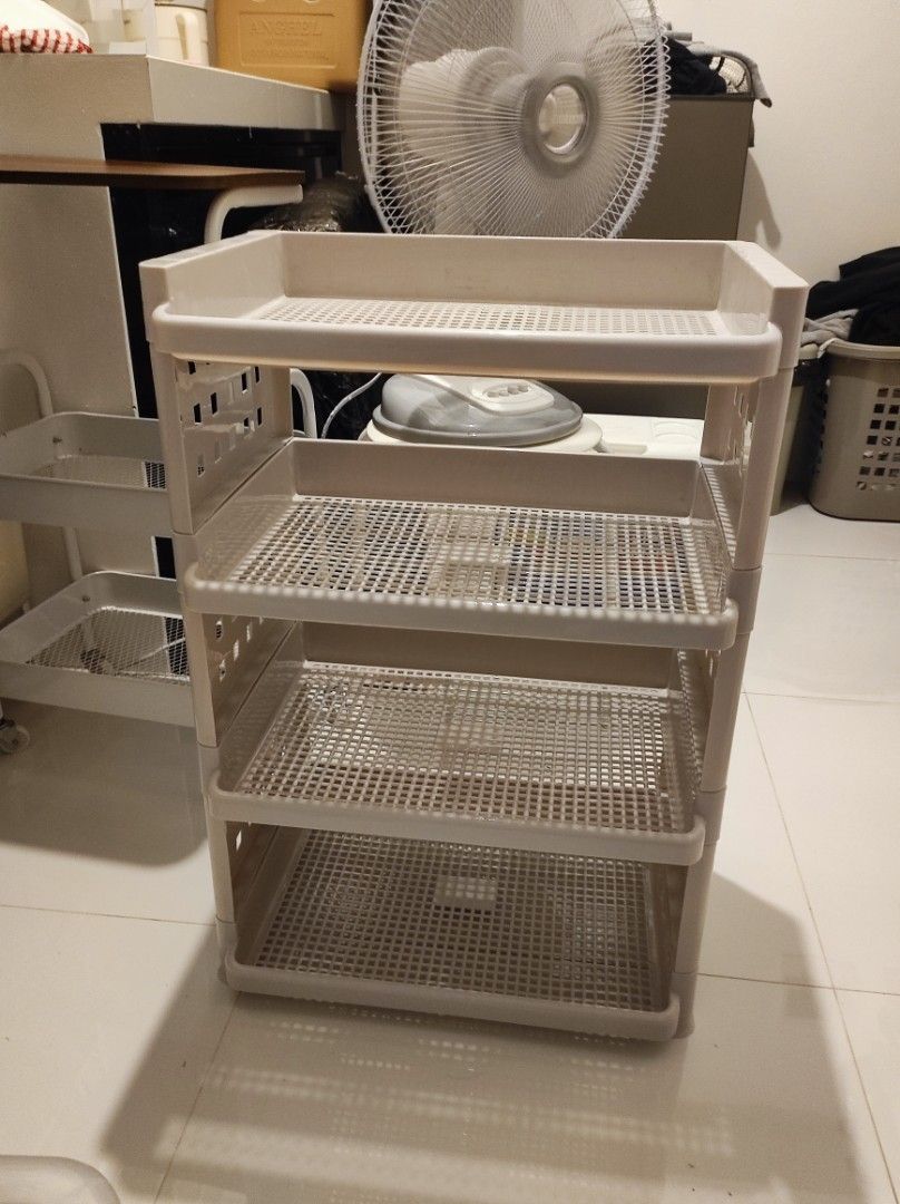 White 4-Tier Plastic Storage Rack with Shelves (Category: Shelves, Cabinets & Racks) located in Manila. Submitted by airen2906 (Listing ID 1459966227, Image 1). Description: rfs: bumili bagong gamit and wala ng space mod: lalamove (cod sf) mop: gcash.