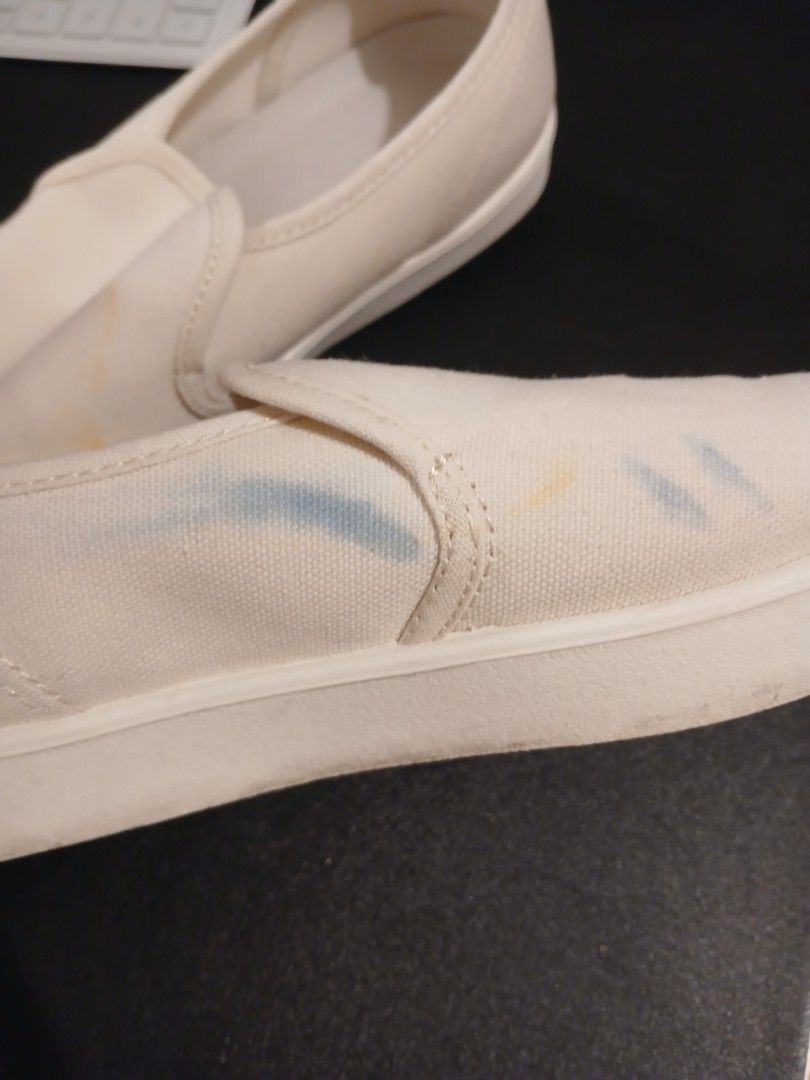 White Canvas Slip-On Shoes (Category: Sneakers) located in Las Pinas. Submitted by online_sarisari (Listing ID 1460039453, Image 3). Description: - White canvas slip-on shoes - Size: JP23.5CM / UK5 / US Women's 7 / US Men's 5.5 - Style: Easy to wear slip-on design - Selling low beacuse of stain..