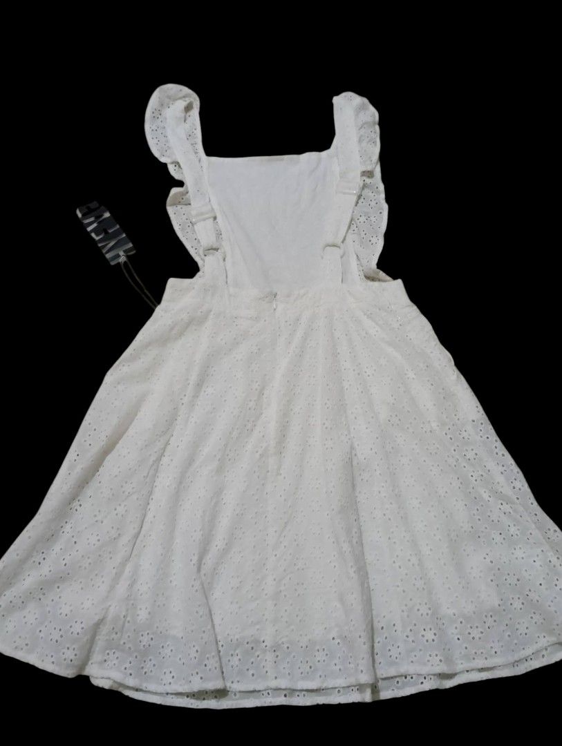 White Eyelet Cotton Dress (Category: Dresses) located in Manila. Submitted by rarefindsgallery (Listing ID 1459955087, Image 3). Description: White Eyelet Sexy Back Cotton Dress Size: Small Brand new condition.