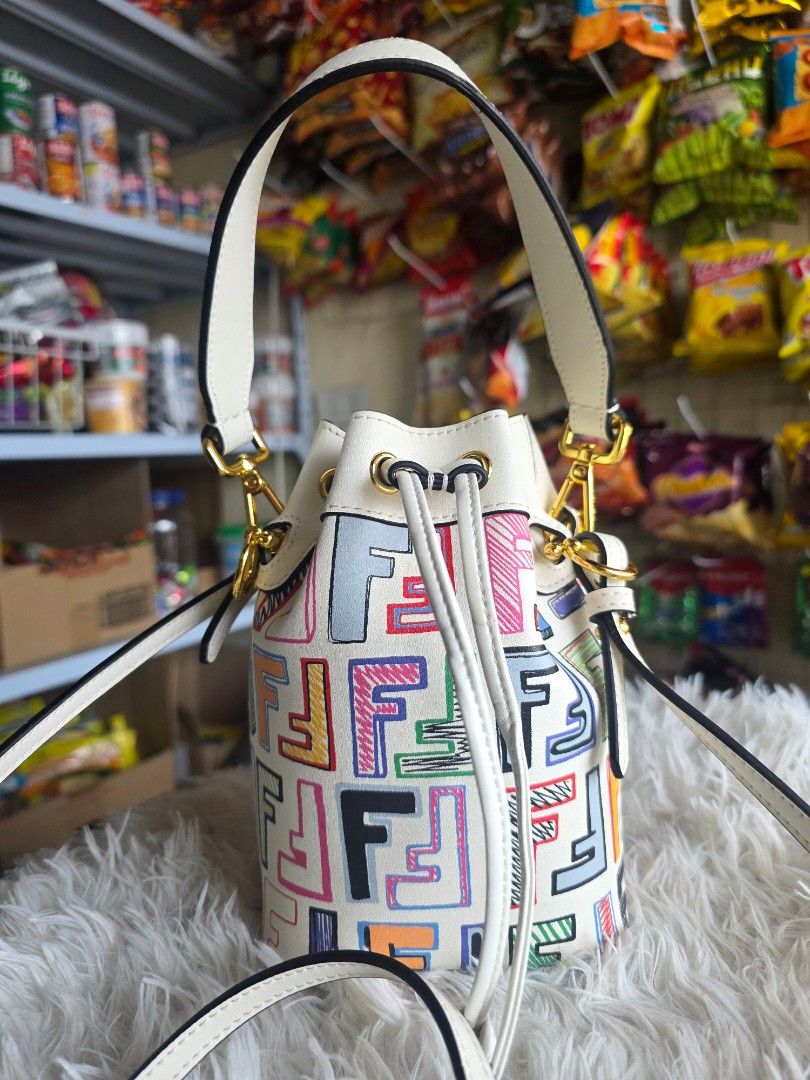 White FF Vertigo Bucket Bag (Category: Shoulder Bags) located in Lemery. Submitted by venus23 (Listing ID 1460022644, Image 2). Description: - White bucket bag - Features the unique FF Vertigo pattern - Elegant gold hardware details - Secure drawstring closure - Versatile with both a top handle and a long strap - Ideal for everyday use or evening events - Standout, unique design.