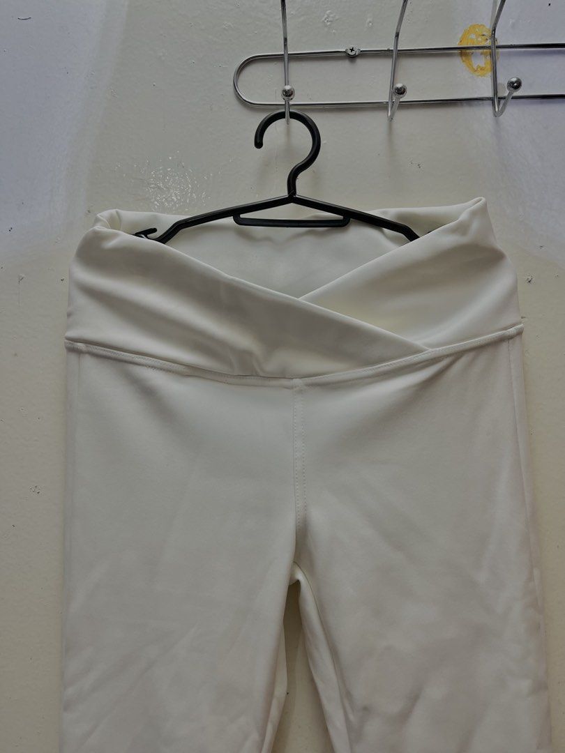 White Flared Pants with V-Waist (Category: Other Bottoms) located in Manila. Submitted by gemini_gurll (Listing ID 1459923447, Image 2). Description: - Chic white flared pants - Flattering V-shaped waist design - Comfortable and stretchy fabric - Versatile for casual or dressed-up looks - Easy to pair with any top.