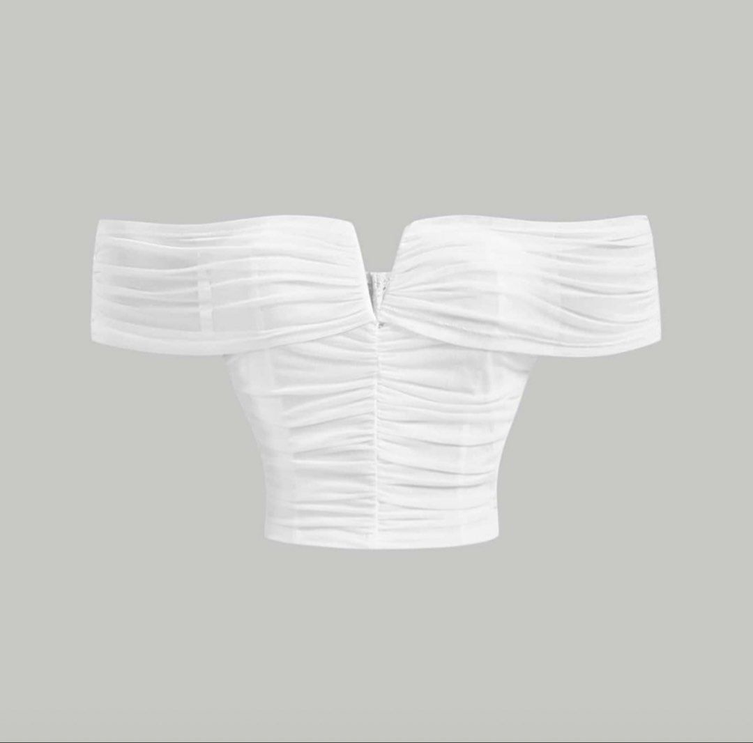 White Off-Shoulder Ruched Mesh SHEIN (Category: Blouses) located in Caloocan City. Submitted by shopkytn (Listing ID 1459974237, Image 1). Description: Shein white off-shoulder top Cropped top Xs to s Loc: Malabon Lalamove if 1-2 tops JnT allowed if more than 2 tops.