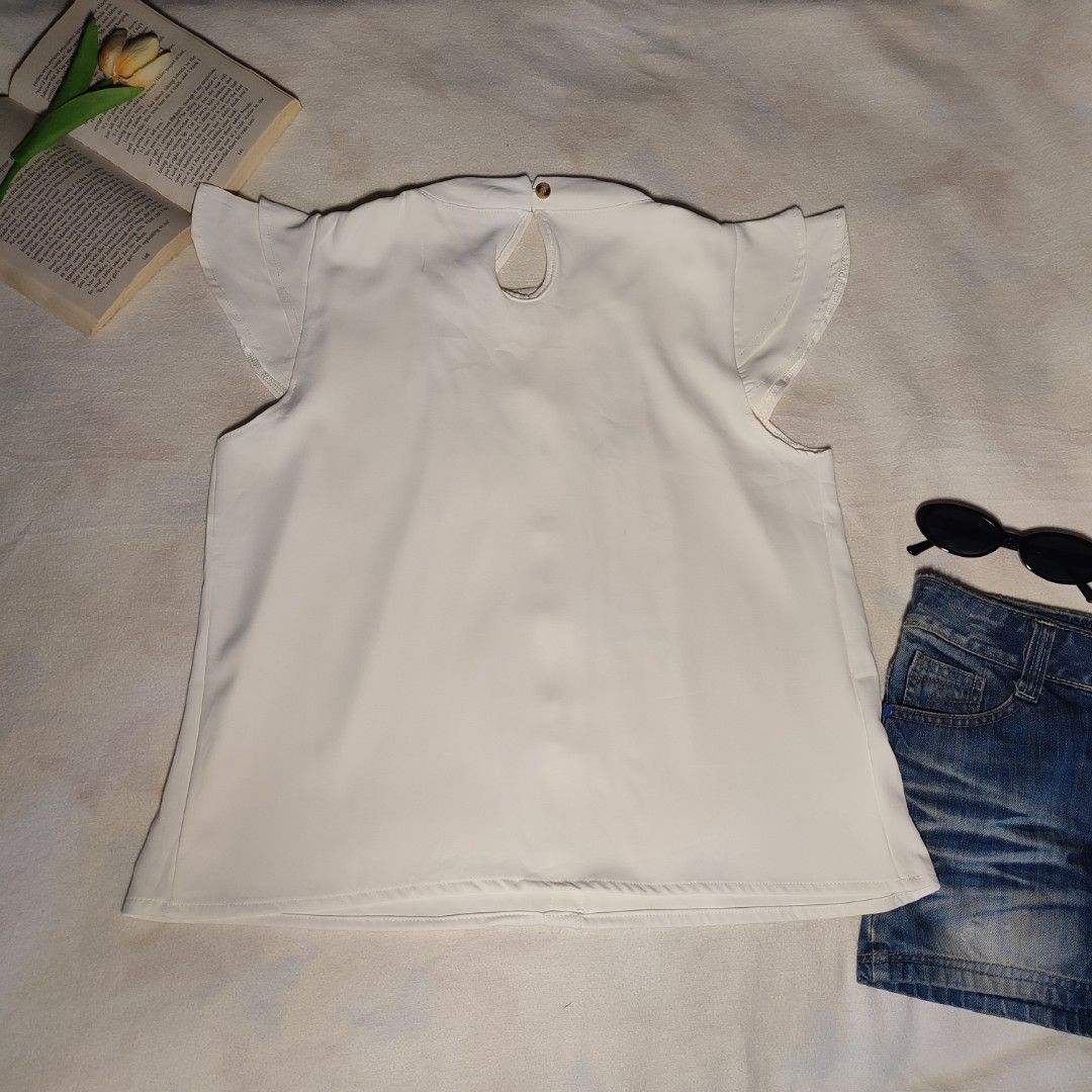 White Pleated Flutter Sleeve Button Up Blouse (Category: Blouses) located in Antipolo. Submitted by _lovedbychie (Listing ID 1460024879, Image 2). Description: White Pleated Flutter Sleeve Button Up Blouse (buttons are design only) 🌸 Size:M-L 🌸 Bust: 36" - 38" • Length: 21.5" 🌸 MOP: Gcash / Maribank 🌸 MOD: J&T / Lalamove message me for more info!.