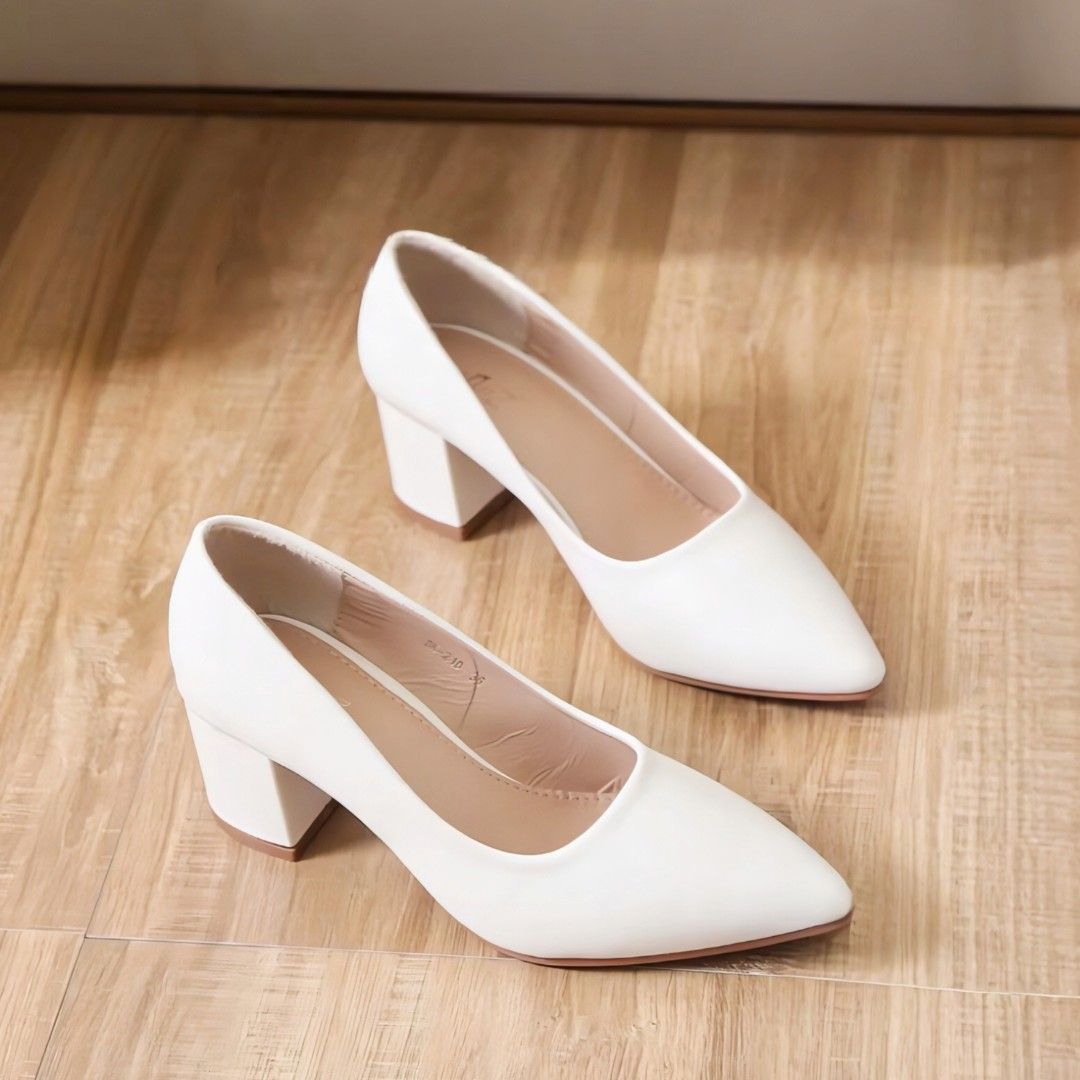White Pointed Toe Block Heels (Category: Heels) located in San Fernando. Submitted by kaiddelrosario (Listing ID 1460064964, Image 1). Description: 🎀 Classic white heels 🎀 Pointed toe design 🎀 Comfortable block heel 🎀 Size 37 (inner sole marking) 🎀 Easy to pair with any outfit 🎀 Suitable for work, night outs, formal events, or everyday wear.