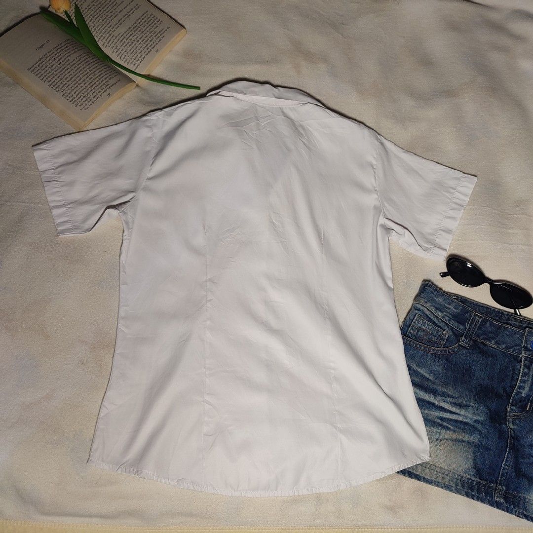 White Short Sleeve Button-down fitted polo shirt (Category: Shirts) located in Antipolo. Submitted by _lovedbychie (Listing ID 1460030890, Image 2). Description: 🌸 Size: S-Semi L 🌸 Bust: 34" -36" • Length: 23" 🌸 MOP: Gcash / Maribank (payment first) 🌸 MOD: J&T / Lalamove Message me for more info!.