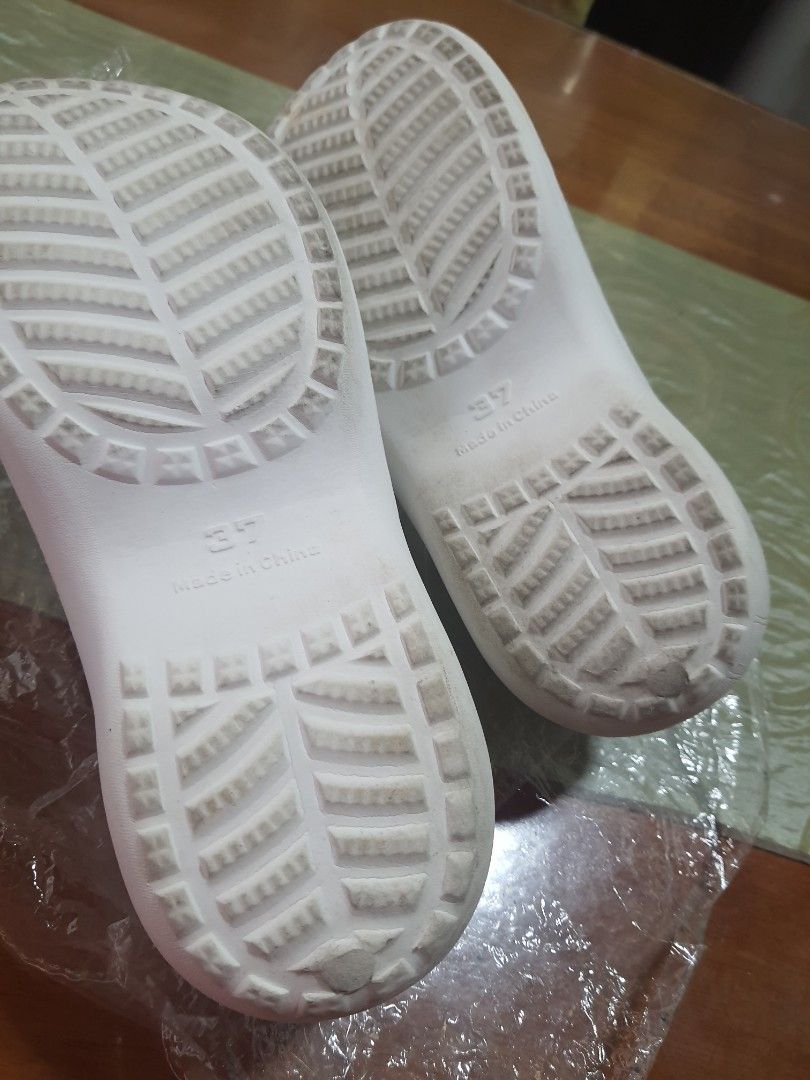 White Slides with Charms - Size 37 (Category: Slippers and slides) located in Quezon City. Submitted by shebesande (Listing ID 1460103204, Image 3). Description: - White slides with adorable charms (unicorn, ice cream, princess) - Size 37 - Textured sole for enhanced grip - Ideal for casual outings or beach days - Made in China.
