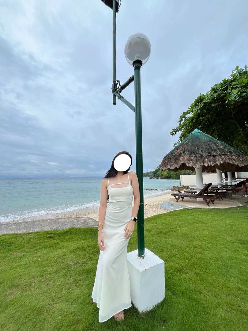 White Strap Maxi Dress (Category: Dresses) located in Cebu City. Submitted by zarizariii___ (Listing ID 1459938441, Image 1). Description: Flowy white maxi dress that I’ve only worn once! The fabric is slightly see-through too making it perfect for beach trips :).