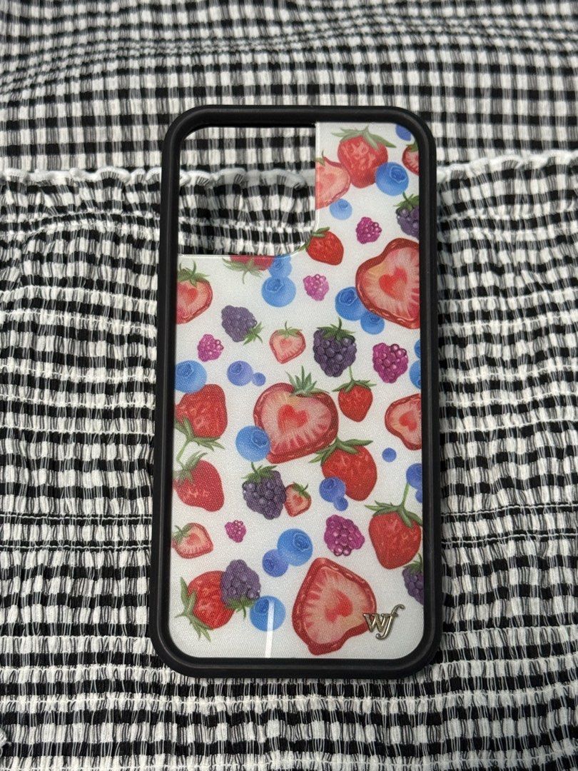 iPhone 16 Pro Max WILDFLOWER Fruit Tart Phone Case (Category: Cases & Sleeves) located in Indang. Submitted by ayanaonfit (Listing ID 1460023419, Image 2). Description: Super cute WILDFLOWER Fruit Tart phone case! 🍓🫐 Perfect for adding a pop of color and fun to your phone. This case features a vibrant print of strawberries, blueberries, and raspberries, giving it a sweet and playful vibe..