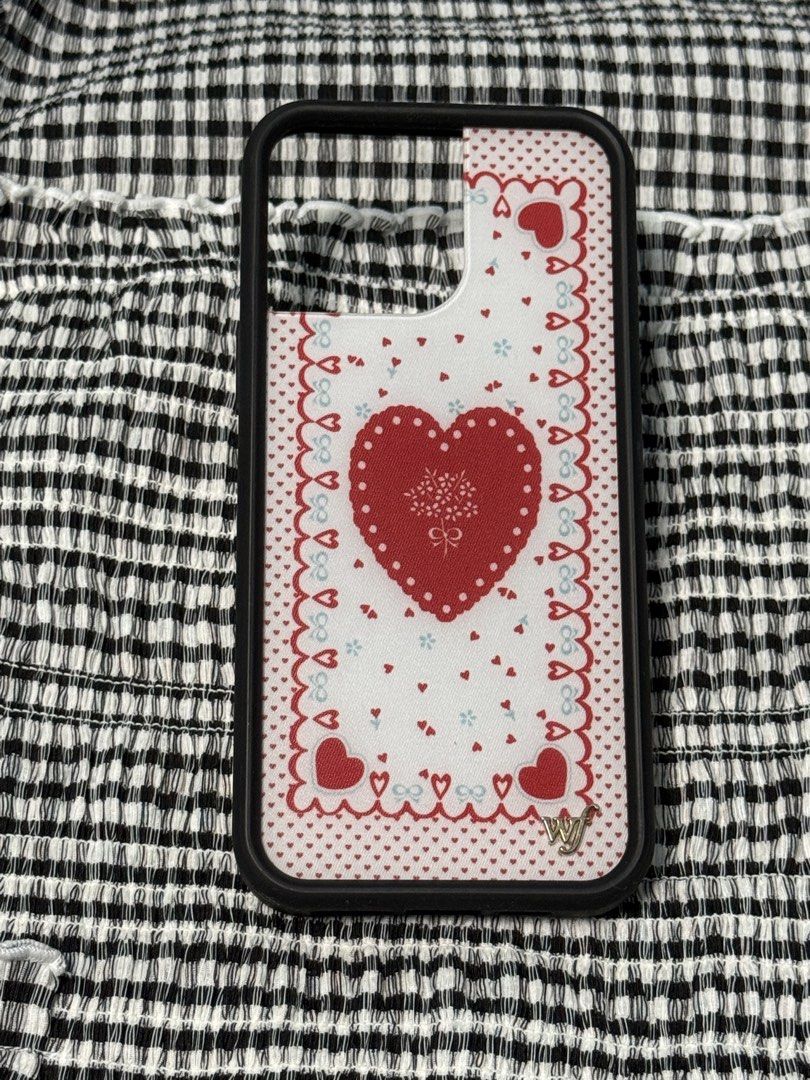 iPhone 16 Pro Max WILDFLOWER Lovers Lane Phone Case (Category: Cases & Sleeves) located in Indang. Submitted by ayanaonfit (Listing ID 1460023244, Image 2). Description: - Brand: WILDFLOWER - Design: Lovers Lane (Red heart, tiny hearts, decorative border) - Condition: Great - Style: Romantic, sweet, charming.