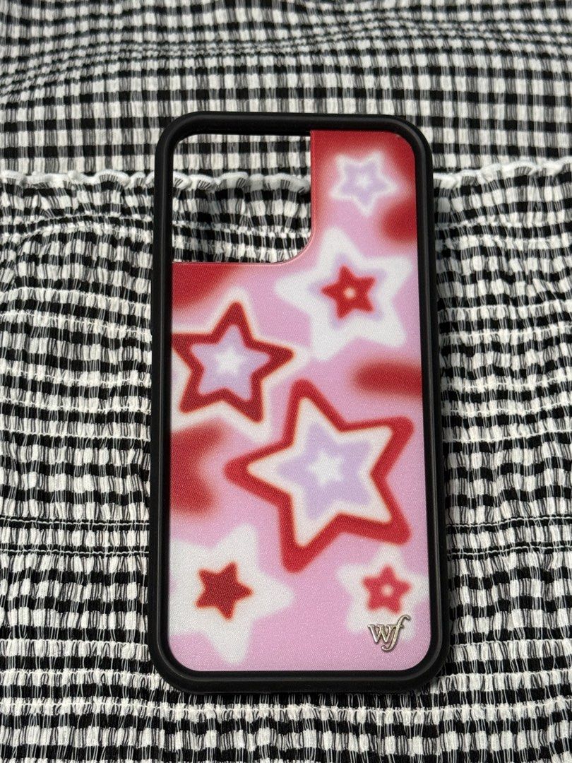 iPhone 16 Pro Max WILDFLOWER Red Dream Star (Category: Cases & Sleeves) located in Indang. Submitted by ayanaonfit (Listing ID 1460023729, Image 1). Description: Hey there! ✨ Check out this super cute WILDFLOWER Red Dream Star phone case! It's got this awesome pink and red star design that's totally dreamy. Perfect for adding a pop of color and fun to your phone. Grab it now and let your phone shine! 💖.