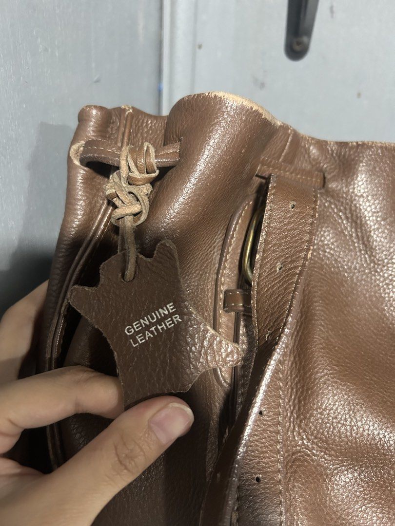 Wittner Leather Handbag - Brown (Category: Tote Bags) located in Manila. Submitted by luevy (Listing ID 1459963302, Image 3). Description: - Wittner brown handbag - Genuine leather - Drawstring closure - Minor signs of wear on top edges - Interior zippered pocket - Classic and versatile for everyday use.