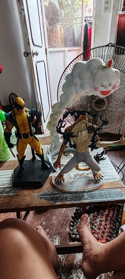 Wolverine and Rob Lucci Action Figures with Stands (Category: Figurines & Statues) located in Manila. Submitted by therealwels (Listing ID 1460014525, Image 3). Description: - Set includes Wolverine and One Piece Rob Lucci action figures. - Wolverine features authentic metal claws. - Rob Lucci comes with a unique cloud stand. - Both figures are displayed on their original bases. - Please note: The cloud stand has visible cracks. - Perfect additio