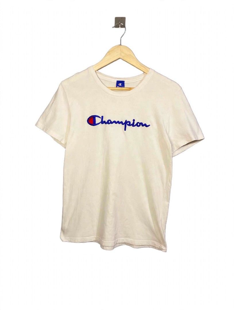 Women's Champion script logo embroidered whiter (Category: Shirts) located in Taguig. Submitted by owlthrifty (Listing ID 1460081988, Image 1). Description: Medium size Good as new ✔️💯 In excellent condition ✔️💯.