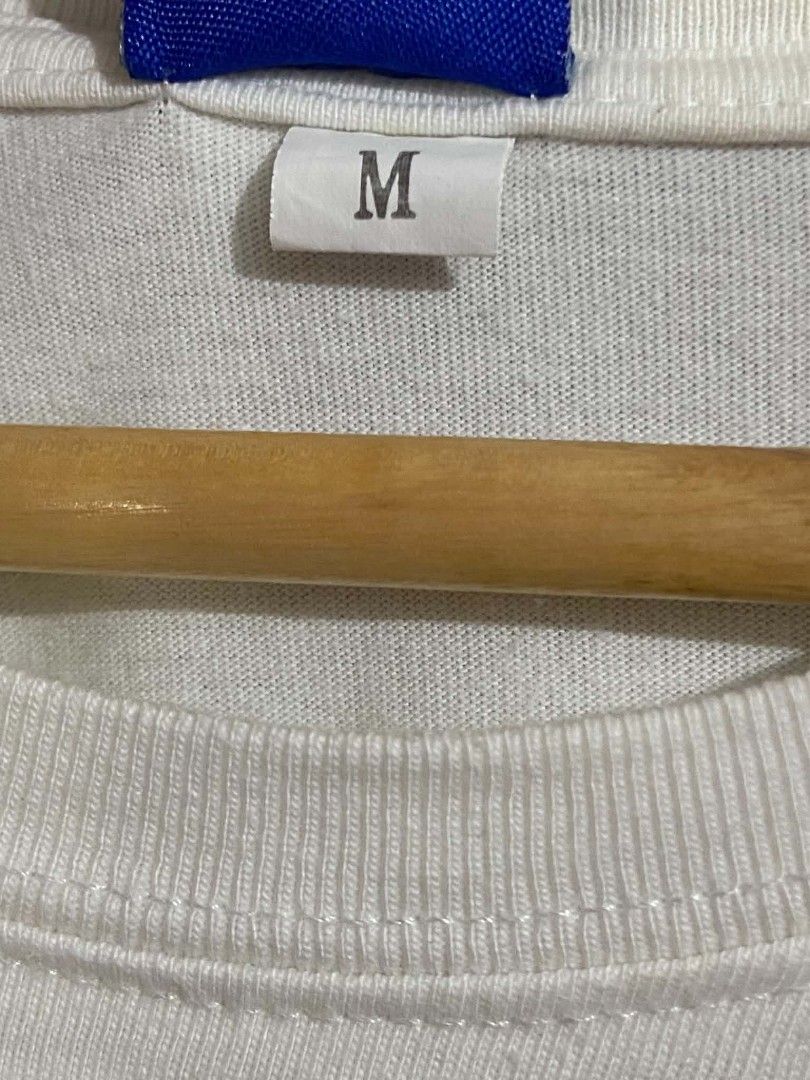Women's Champion script logo embroidered whiter (Category: Shirts) located in Taguig. Submitted by owlthrifty (Listing ID 1460081988, Image 3). Description: Medium size Good as new ✔️💯 In excellent condition ✔️💯.