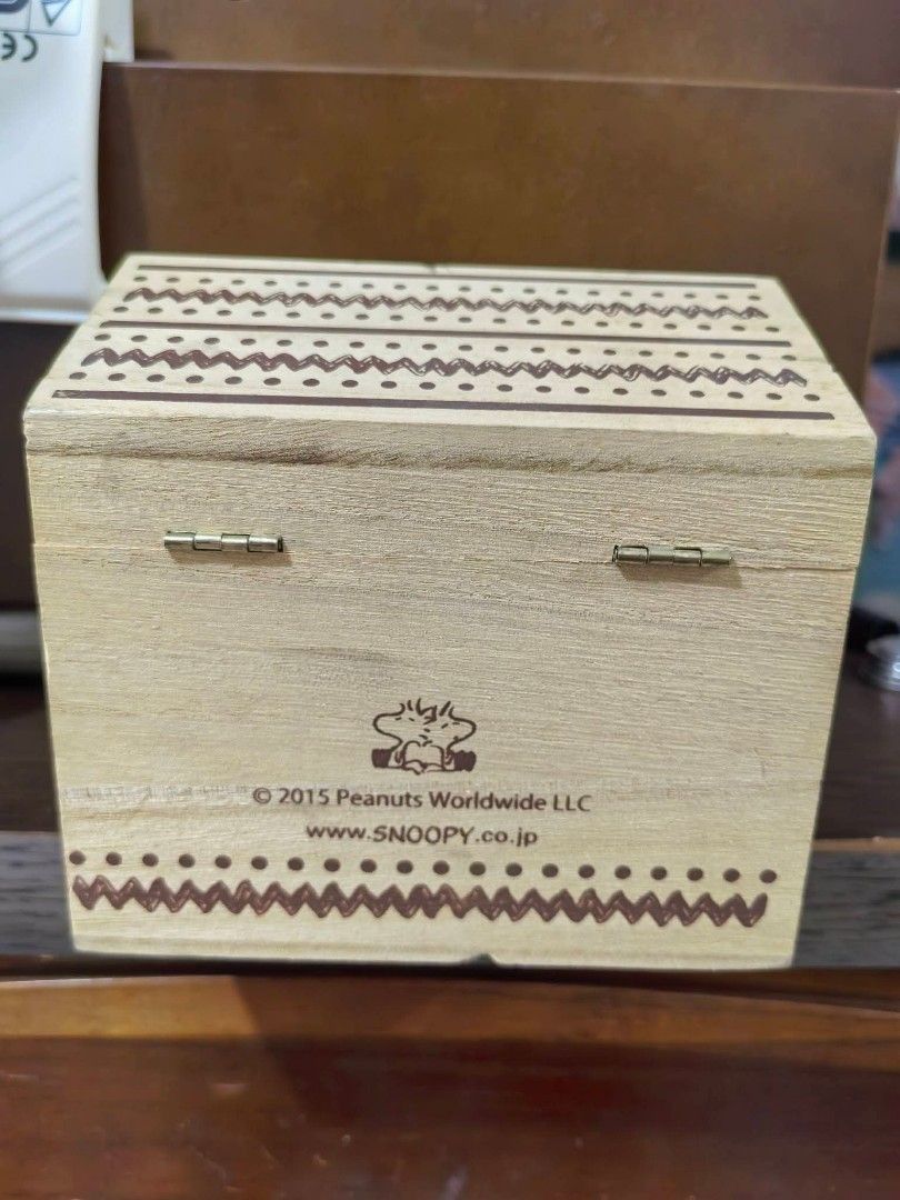 Wood Storage Box - Peanuts (Category: Accessory Holder, Box & Organizers) located in Cebu City. Submitted by dudes_villanueva (Listing ID 1459941711, Image 2). Description: Wood Storage Box - Peanuts 📌 Featuring an engraved illustration of Snoopy and the Peanuts logo on the front. 📌 In excellent condition. L5.25xW4.9xH5 in.