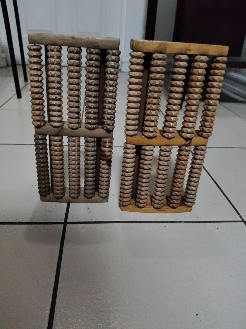Xmas Discount!!! Wooden Foot Roller Massager 2x (Category: Massage Devices) located in Quezon City. Submitted by oddduck02 (Listing ID 1459910393, Image 2). Description: - 2x pieces wooden foot roller massager - Features multiple rollers for effective foot massage - Perfect for relieving tired feet after a long day - Simple and easy to use: just by rolling your feet over them - Reason for selling = Cleaning house - Approximate Size = L - 10 1/2in