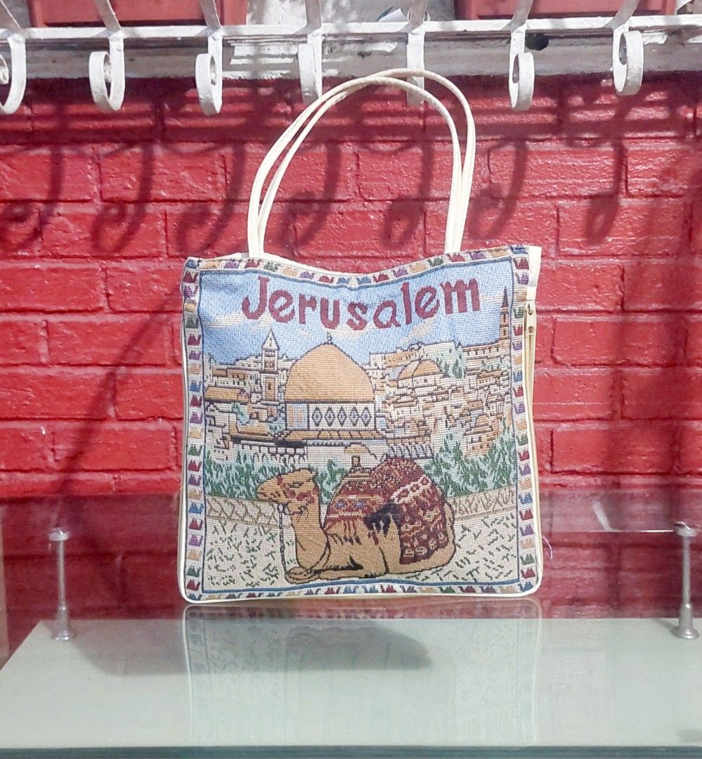 Woven Jerusalem Tote Bag (Category: Purses & Pouches) located in Quezon City. Submitted by donjie (Listing ID 1460039179, Image 1). Description: Collectible Bag From Jerusalem Zip Souvenir Tote Width: 13.5 inches Height: 13.5 inches Depth: 2 inches.