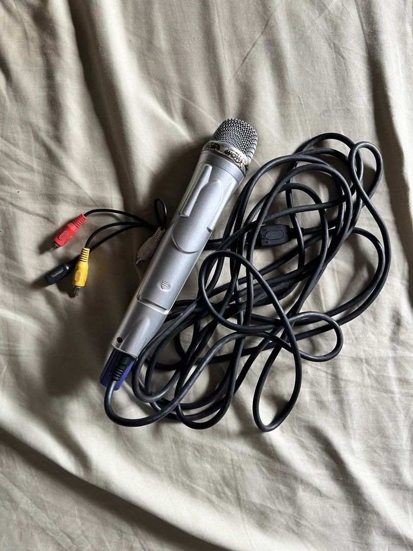 Wow Magic Sing ED 9000 (Category: Microphones) located in Las Pinas. Submitted by unareyes (Listing ID 1459912602, Image 1). Description: - Complete Wow karaoke microphone set - Includes microphone, cables, and song list book - All items fit in a black carrying case - Ideal for parties and home entertainment.