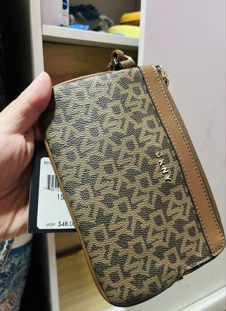 Wristlet DKNY Free SF manila (Category: Wallets & Card holders) located in Manila. Submitted by gee0505 (Listing ID 1459951626, Image 2). Description: Bnew never been used . 3k plus srp ..
