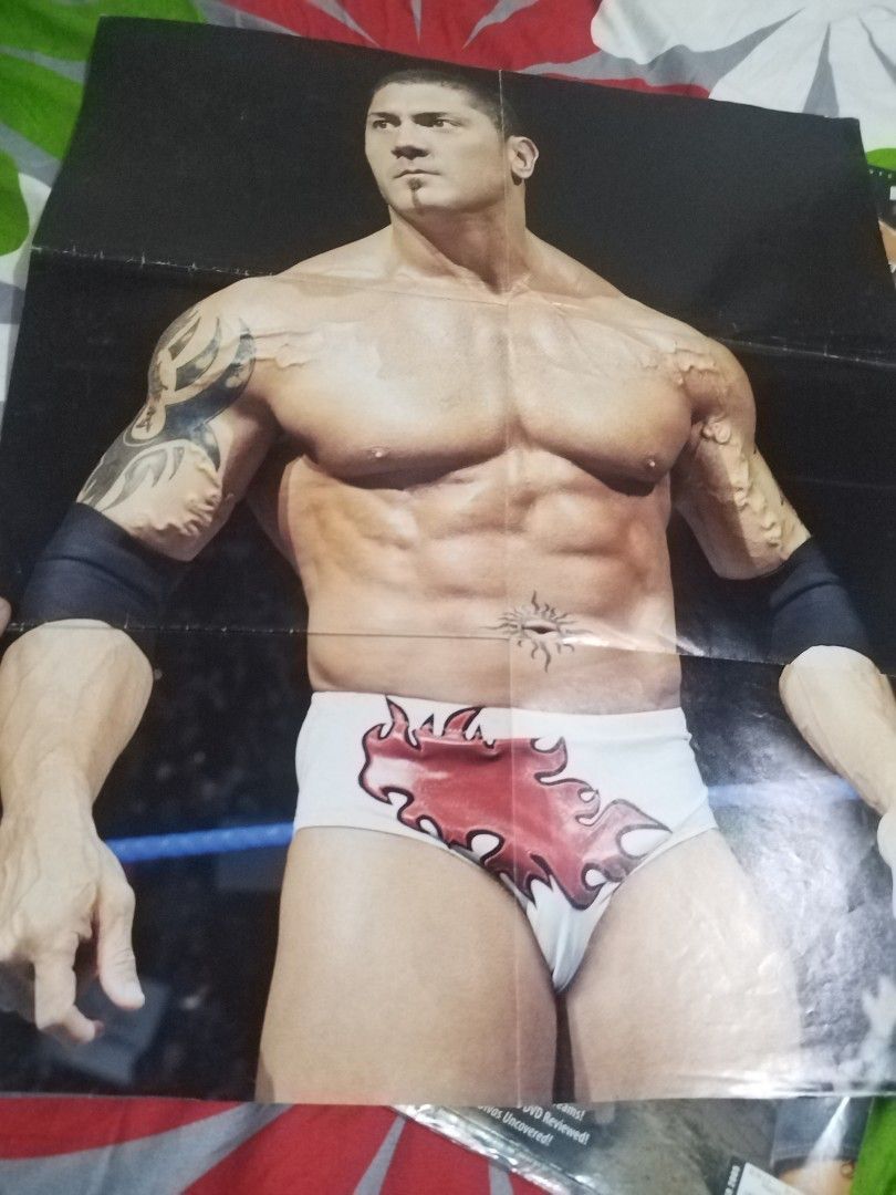 WWE SmackDown Magazine - Batista Cover (Category: Magazines) located in Manila. Submitted by pickerjessie (Listing ID 1460060840, Image 2). Description: - WWE SmackDown magazine featuring Batista on the cover. - Includes a giant, collectible Batista poster inside. - Content also features Melina and other wrestling news. - A must-have for any dedicated WWE fan. - Own a piece of wrestling memorabilia..