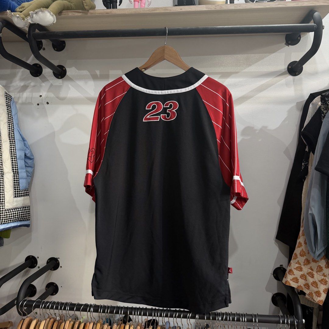 Y2k Jordan Baseball Jersey (Category: Formal Shirts) located in Bambang. Submitted by heats777 (Listing ID 1460085609, Image 3). Description: Excellent condition Issue: Last pic (working) Featuring a jordan script on chest, snap buttons, small 23 on back and stripe sleeves Size: M.