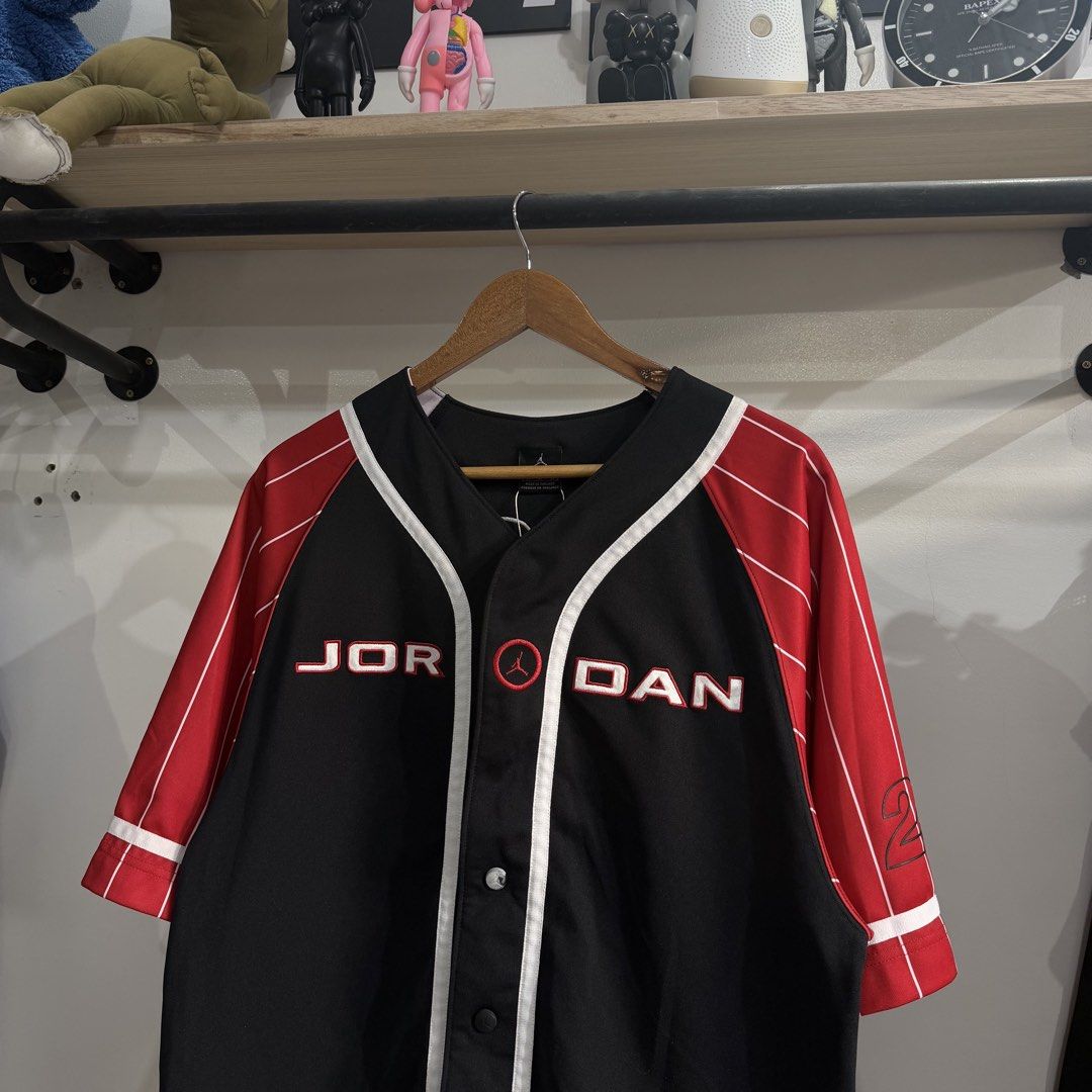 Y2k Jordan Baseball Jersey (Category: Formal Shirts) located in Bambang. Submitted by heats777 (Listing ID 1460085609, Image 1). Description: Excellent condition Issue: Last pic (working) Featuring a jordan script on chest, snap buttons, small 23 on back and stripe sleeves Size: M.