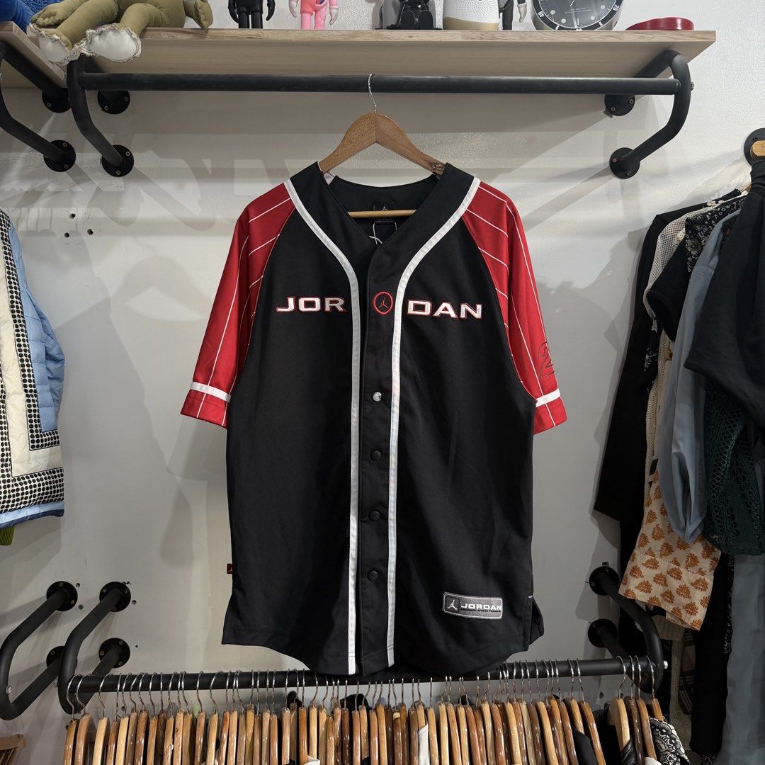 Y2k Jordan Baseball Jersey (Category: Formal Shirts) located in Bambang. Submitted by heats777 (Listing ID 1460085609, Image 2). Description: Excellent condition Issue: Last pic (working) Featuring a jordan script on chest, snap buttons, small 23 on back and stripe sleeves Size: M.