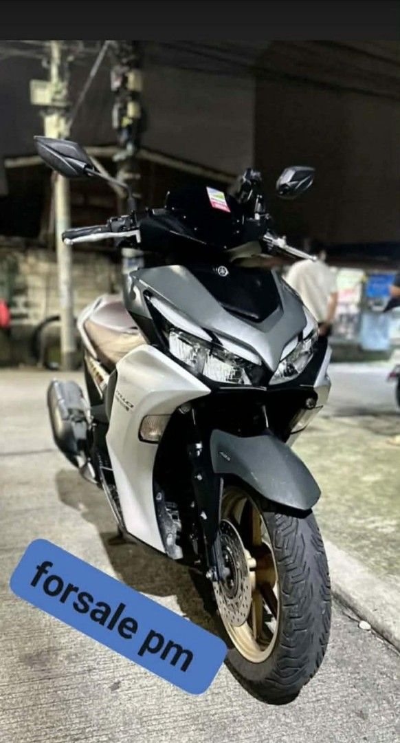 Yamaha Aerox 155cc Scooter (Category: Motorbikes for Sale) located in Manila. Submitted by qwerty.02 (Listing ID 1460029054, Image 1). Description: Aerox v2 limited edition ABS 2022 model ❗ Complete legal papers Original Or / Cr Original LTO plate# Gana lahat Ng wirings naka mini driving light nadin Keyless 27k Oddo All Stock engine Good Condition and Running Condition Sobrang Tahimik Ng Makina Naka Mags Nadin gas n go 💯 Honest issue : scratch l