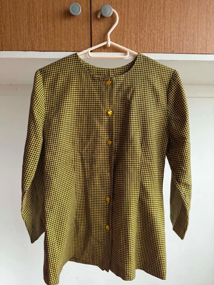 Yellow and Black Gingham Button-Up Blouse (Category: Blouses) located in Manila. Submitted by atozstuff (Listing ID 1460095733, Image 1). Description: - Cute yellow and black gingham pattern - Long sleeves - Button-up front - Mustard yellow buttons - Classic, slightly retro feel - Versatile for casual or dressed-up outfits - Easy to pair with jeans or skirts.