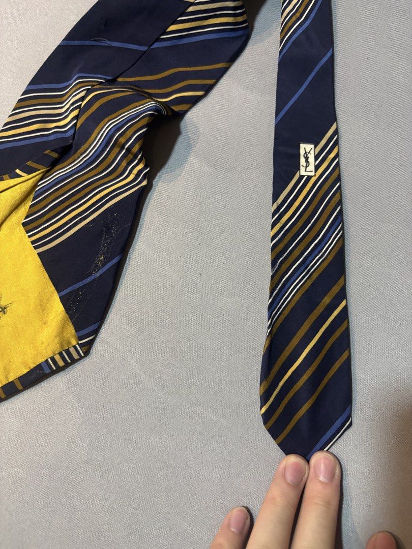 Yves Saint Laurent YSL navy pattern necktie (Category: Ties) located in Manila. Submitted by maxxxxxxxxxxxx (Listing ID 1459922222, Image 3). Description: For sale Authentic Vintage YSL Necktie STRIPE TYPE colour pattern Navy blue base colour Silk material super soft Has some dirt needs wash .