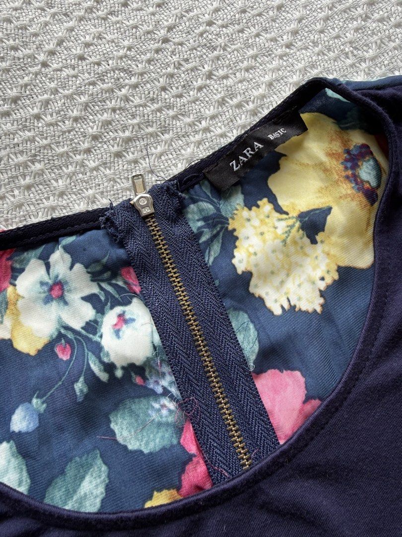 Zara basic floral top (Category: Blouses) located in Taguig. Submitted by vrncng (Listing ID 1460065668, Image 3). Description: - dark blue color - back floral design with zipper.