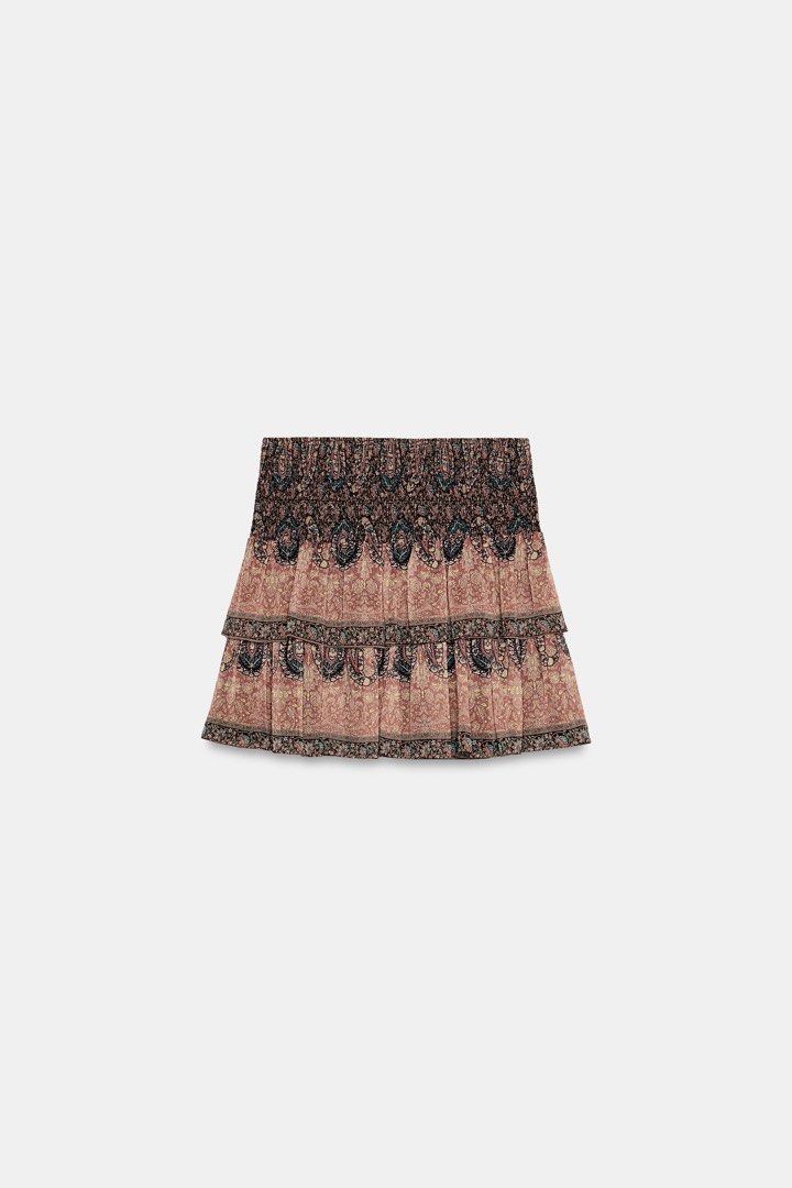 Zara Boho Patterned Short Mini Skirt (Category: Skirts) located in Las Pinas. Submitted by kylloren_ (Listing ID 1459999350, Image 1). Description: - still negotiable for sure buyers :3 - xs but can fit up to 29” wl - first photo for inspo only :) helping tags [h&m, mango, zara, uniqlo, brandy melville, princess polly, y2k, coquette, dainty, vintage, early 2000s, grunge, cottagecore, basics, preppy, goth, fairycore, fairy, edikted, hollister, miu
