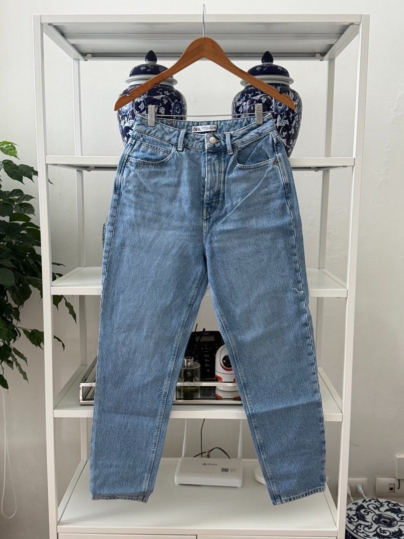 ZARA Mom Jeans (Category: Jeans) located in Makati City. Submitted by madame.kaye (Listing ID 1459930686, Image 1). Description: - Zara light wash mom jeans - Made in Turkey - Size: EUR 36 / US 4 / MEX 26 - Classic five-pocket styling - Button and zip fly - Relaxed fit through hip and thigh, slight taper at ankle - Versatile staple piece for any wardrobe.
