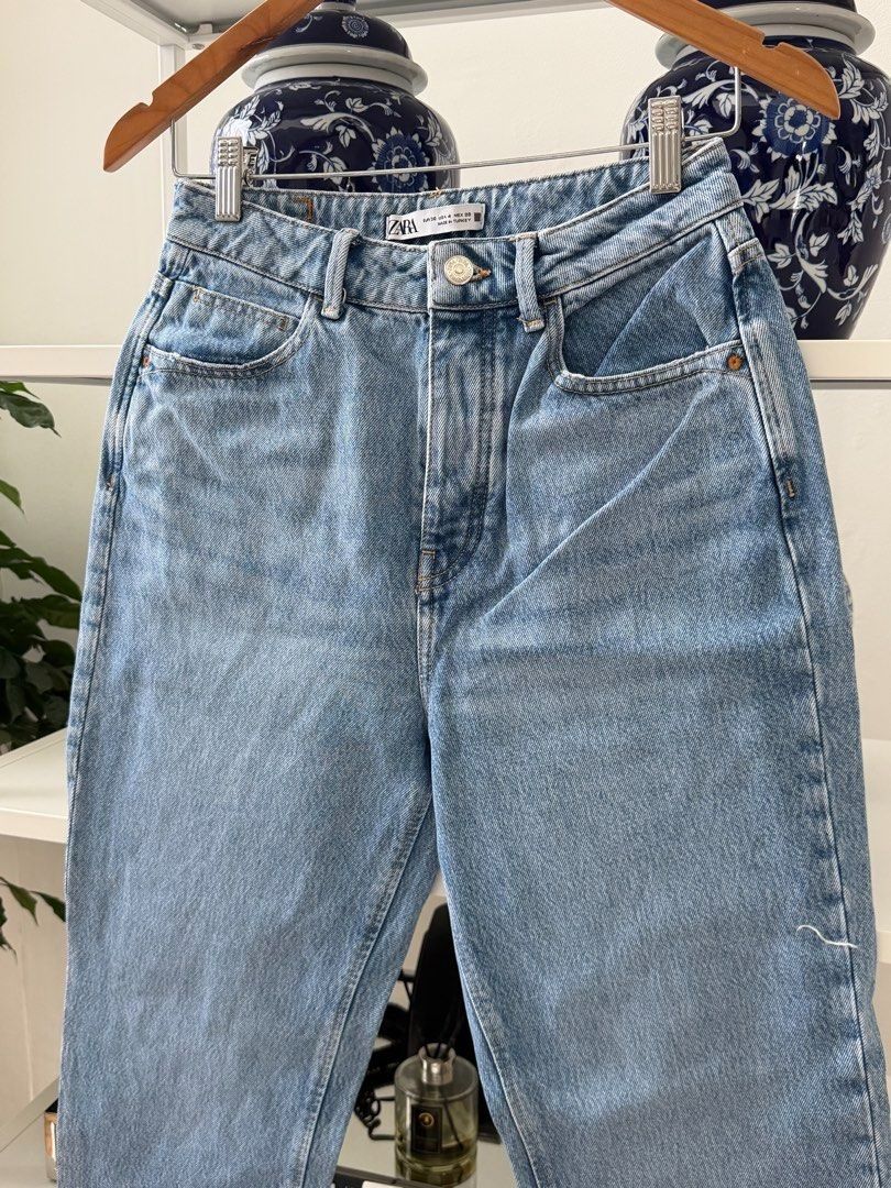ZARA Mom Jeans (Category: Jeans) located in Makati City. Submitted by madame.kaye (Listing ID 1459930686, Image 3). Description: - Zara light wash mom jeans - Made in Turkey - Size: EUR 36 / US 4 / MEX 26 - Classic five-pocket styling - Button and zip fly - Relaxed fit through hip and thigh, slight taper at ankle - Versatile staple piece for any wardrobe.