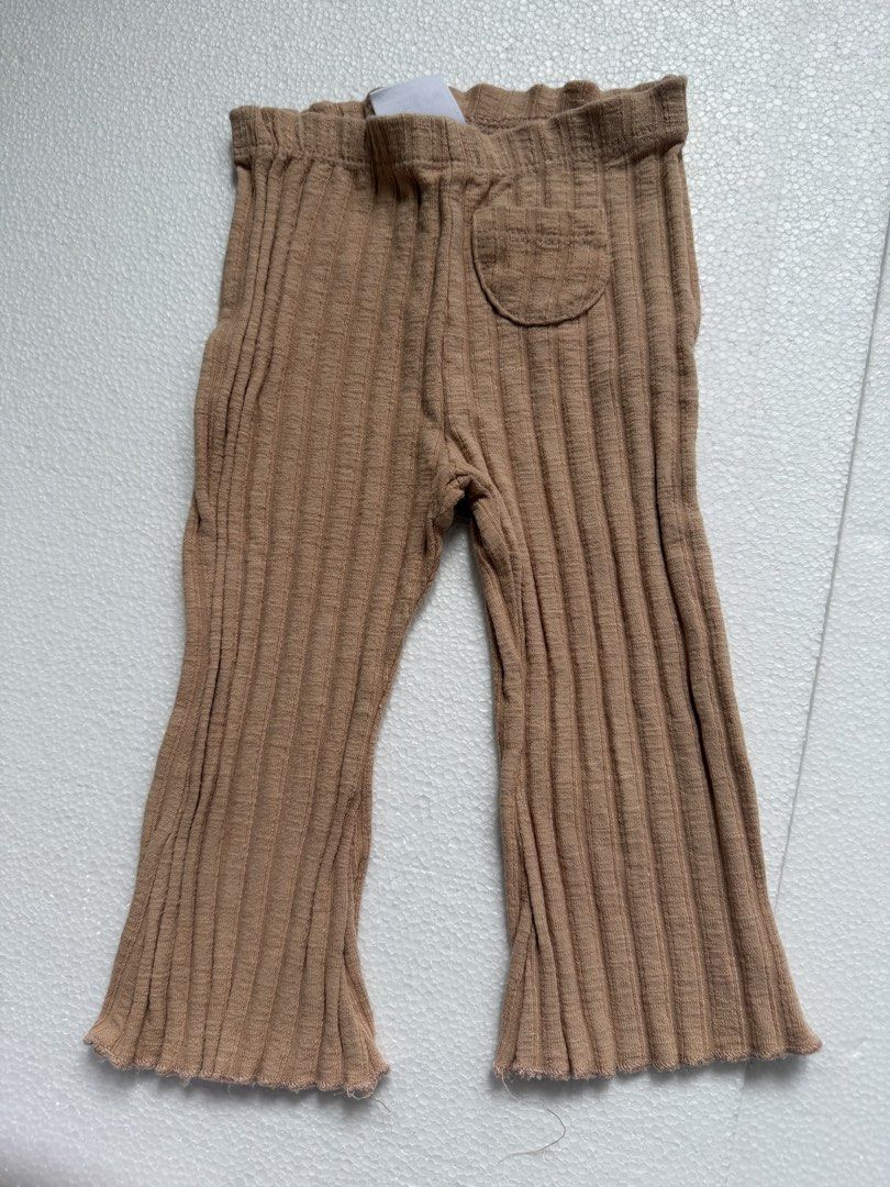 Zara Ribbed Flare Pants 9-12 Months (Category: Babies & Kids Fashion) located in Quezon City. Submitted by doryscloset (Listing ID 1459964818, Image 1). Description: - Cute ribbed flare pants from Zara - Color: Tan/Brown - Size: 9-12 months (80cm) - Made in Turkey - Comfortable elastic waistband - Small pocket detail on the front - Ideal for everyday wear.