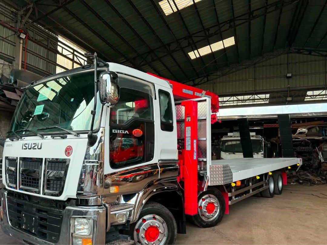 12W Selfloader with Boom 5tons + Ramp & Winch New Face 6UZ1 (Category: Heavy Vehicles) located in Bulacan. Submitted by arvin_custodio (Listing ID 1460134427, Image 2). Description: Isuzu Giga 12W Selfloader with Boom 5tons + Ramp & Winch New Face 6UZ1 engine Chrome face Molye Alcoa rim Aircon cabin Complete papers Cash/Financing Call: 0919-096-9833 .