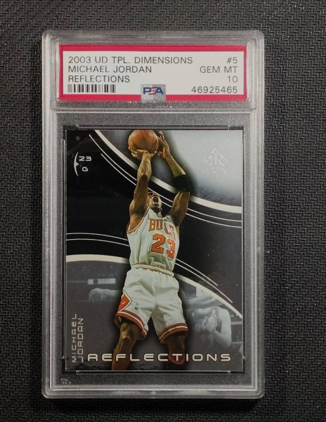 2003 Upper Deck Michael Jordan Reflections Card #5 PSA 10 (Category: Graded Singles) located in Marikina City. Submitted by jaijao (Listing ID 1460138471, Image 1). Description: - 2003 Upper Deck Michael Jordan Reflections Card - Graded GEM MT 10 by PSA - Card Number: #5 - Features Michael Jordan in his iconic Chicago Bulls uniform - A must-have for any serious basketball card collector.