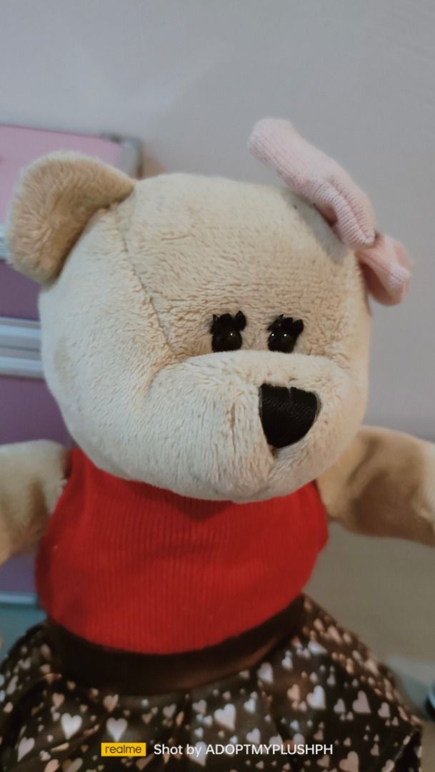 2011 Starbucks Bearista Bear (102nd Edition) (Category: Plushies & Soft Toys) located in Taguig. Submitted by adopt.my.plush.ph (Listing ID 1460233690, Image 2). Description: 2011 Starbucks Bearista Bear (102nd Edition) released for Valentine's Day, featuring a light brown plush body, a pink hair bow, a red top, and a heart-patterned skirt holding a love letter tag ‼️Last Price (LP) Posted. Fixed. Non-negotiable. Not subject to a bundle price. *a