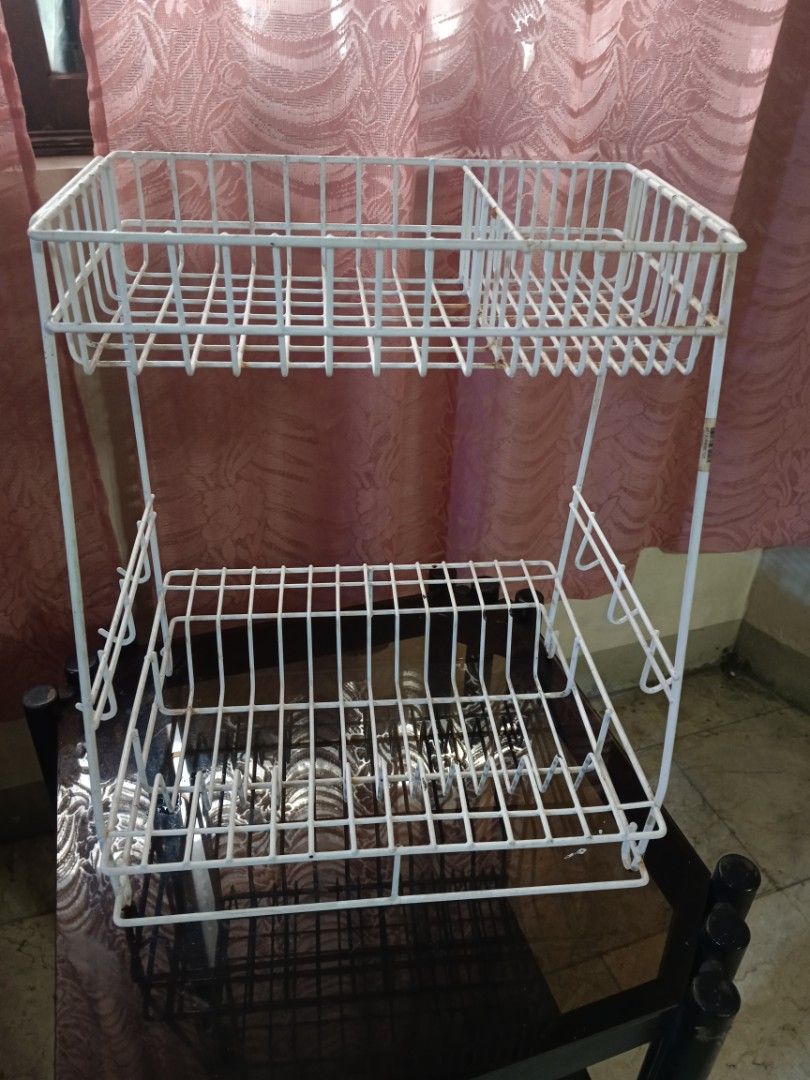 2-Tier White Wire Dish Rack with Utensil Holder (Category: Other Kitchenware & Tableware) located in Manila. Submitted by maxinmei (Listing ID 1460145621, Image 2). Description: - Two-tier white wire dish rack - Bottom tier for plates and bowls - Top tier for cups and smaller items - Includes a side holder for utensils - Perfect for organizing your kitchen sink area - No refund RFS: college funds MOP: Gcash/Maribank/Gotyme MOD: Lalamove 📍 Locati