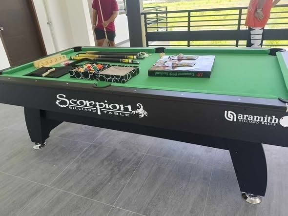 4x8 ft. Scorpion Billiard Table with accesories (Category: Billiards and Bowling) located in Caloocan City. Submitted by warmshark-d5dd7f (Listing ID 1460111831, Image 1). Description: - Scorpion billiard table - Full set of Aramith billiard balls - Multiple billiard cues included - Billiard rack - Book on tournament pool - Ideal for game rooms and entertainment spaces - Ready for your next game night!.